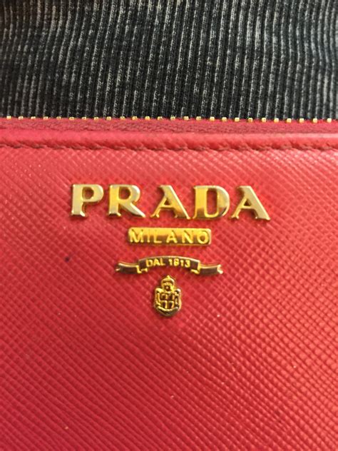 how can you tell if a prada wallet is real|prada purse fake.